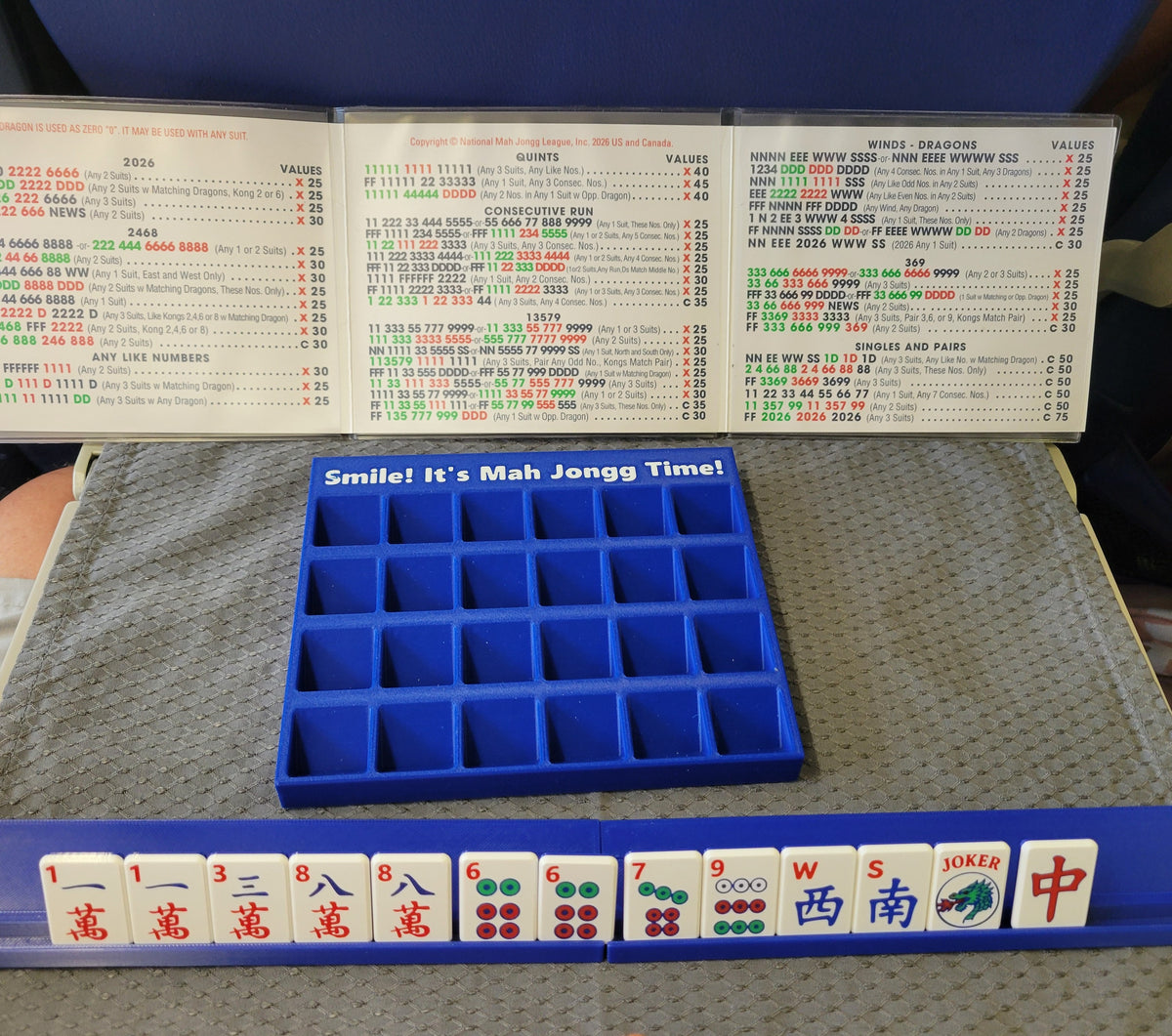 Playing Mah Jongg Solitaire on an airplane pull down tray! 